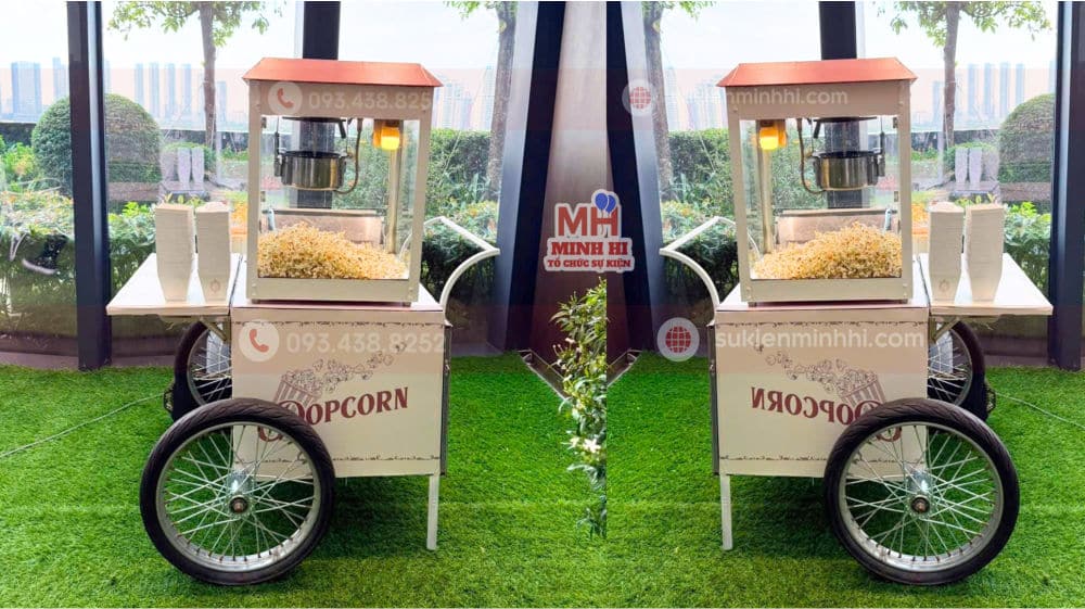 Dịch Vụ Làm Bắp Rang Bơ Chuyên Nghiệp Cho Sự Kiện Tại TPHCM Máy làm bắp rang bơ với thiết kế dạng mô hình xe theo yêu cầu của sự kiện